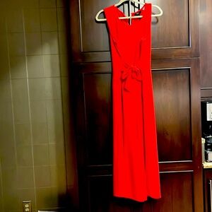 56. Great jumpsuit tie in front or back !